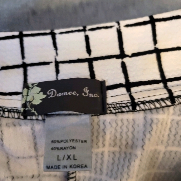 Super cool black and white button down shirt. - Picture 3 of 4